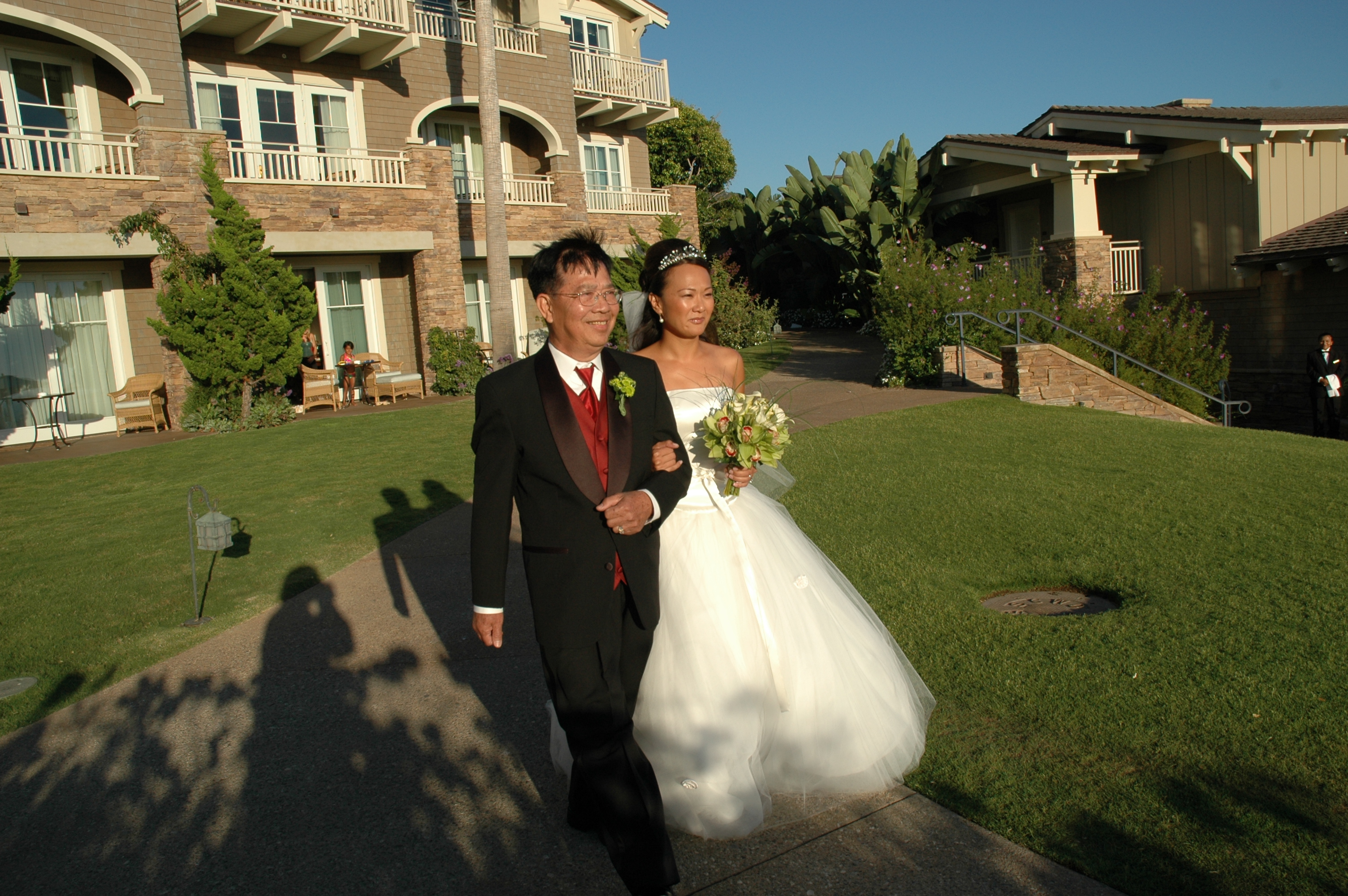 Tami walking with her father
