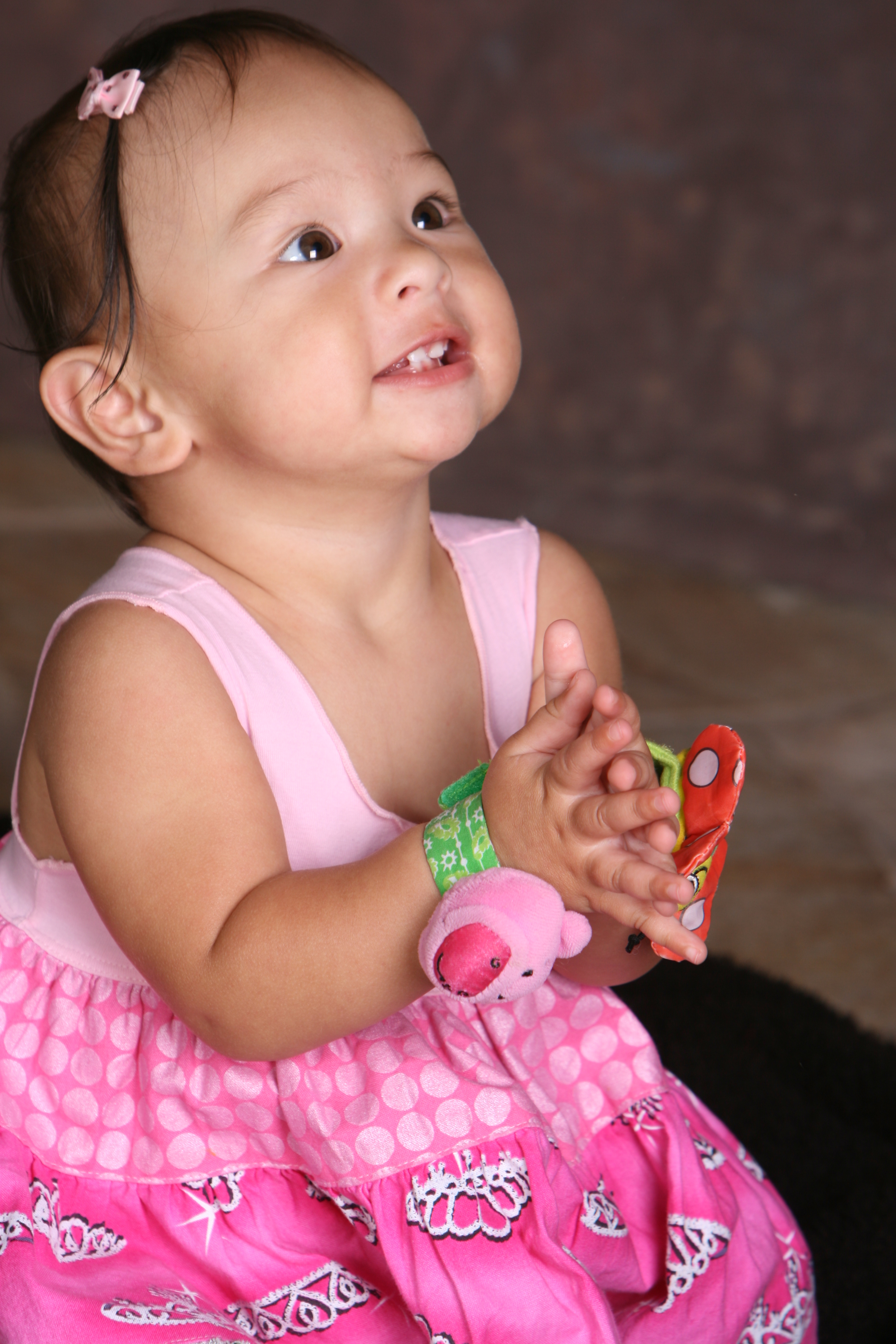 Emma as a toddler, clapping