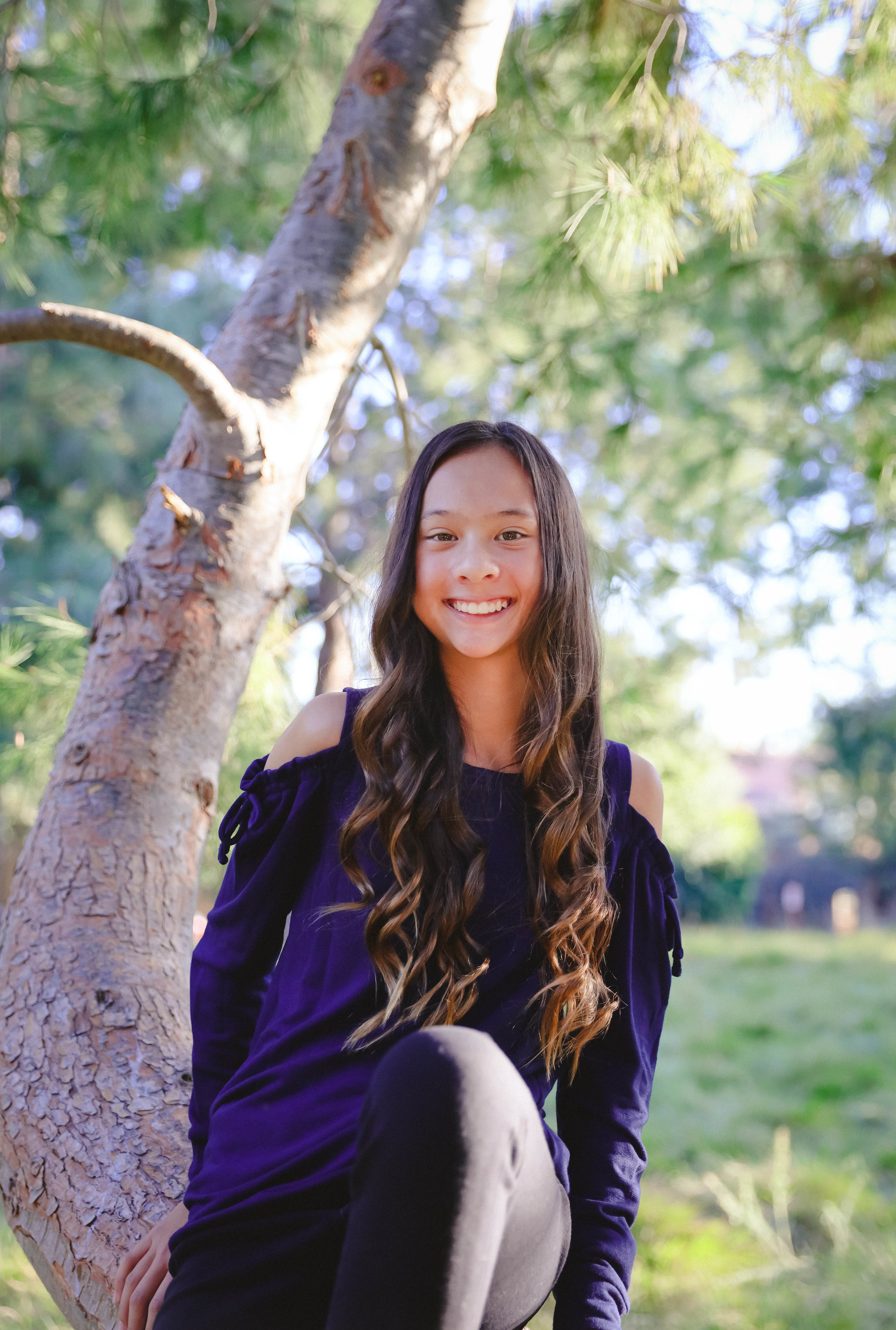 Emma in a tree