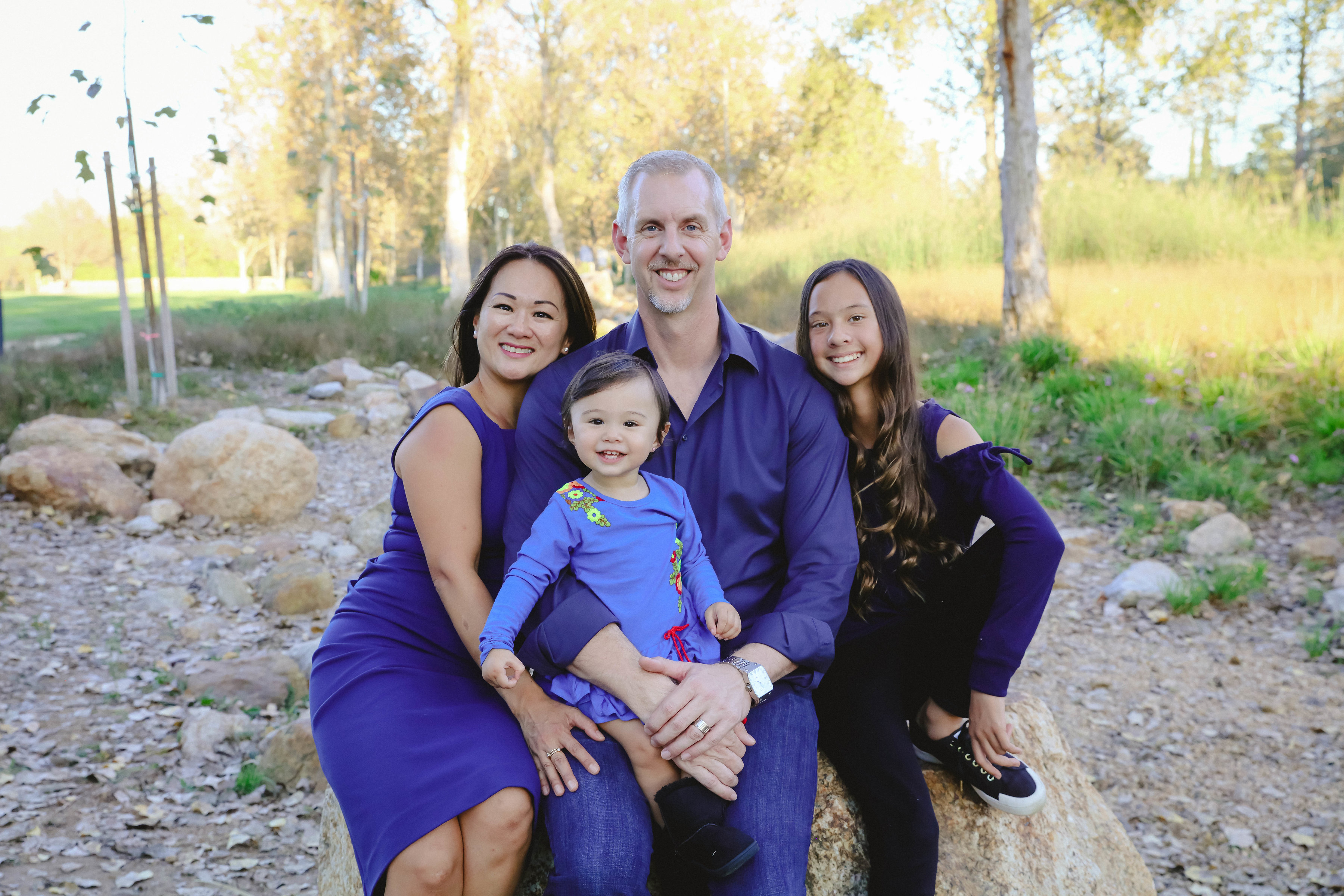 The family of four on the rocks