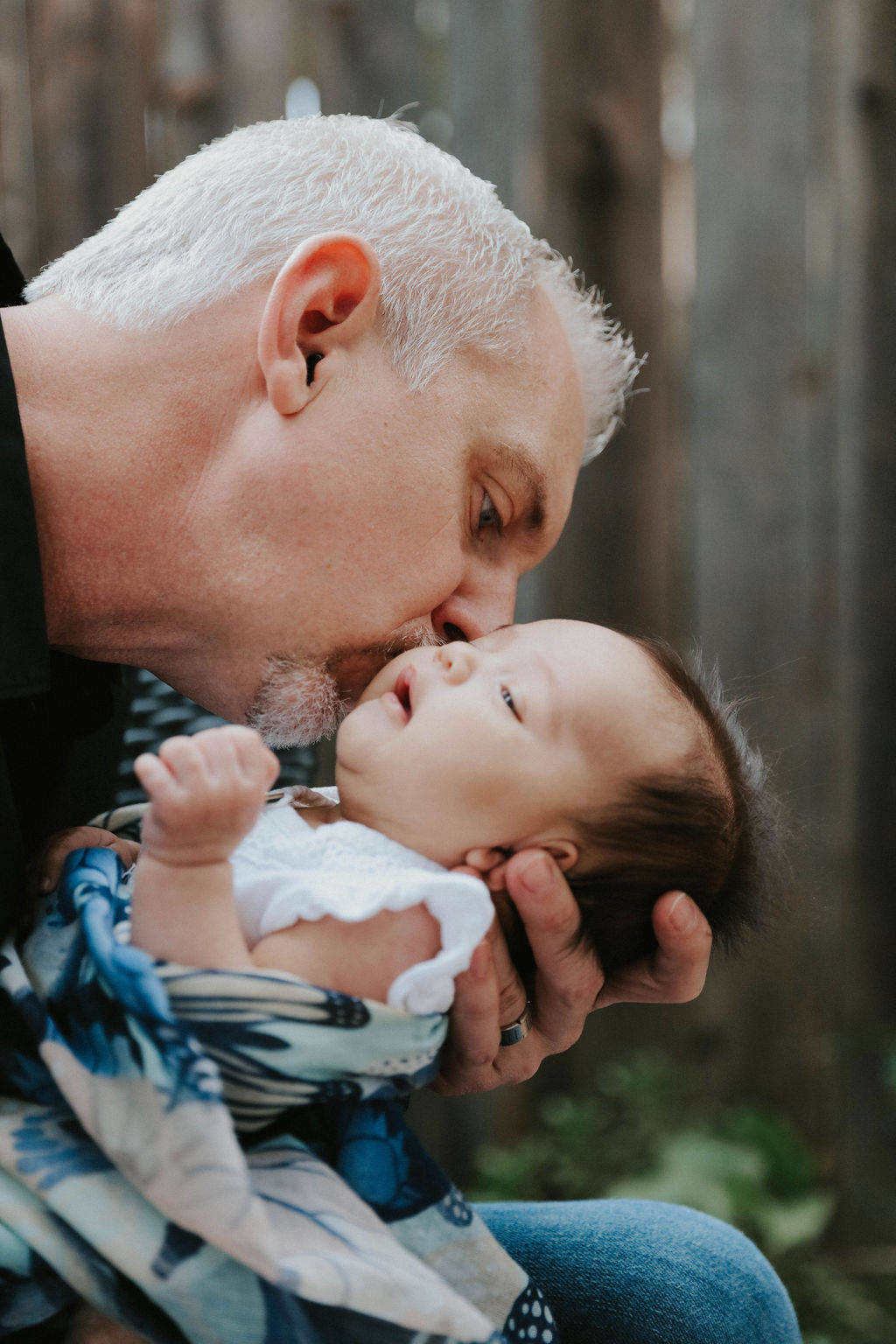 Sean kissing baby Riley