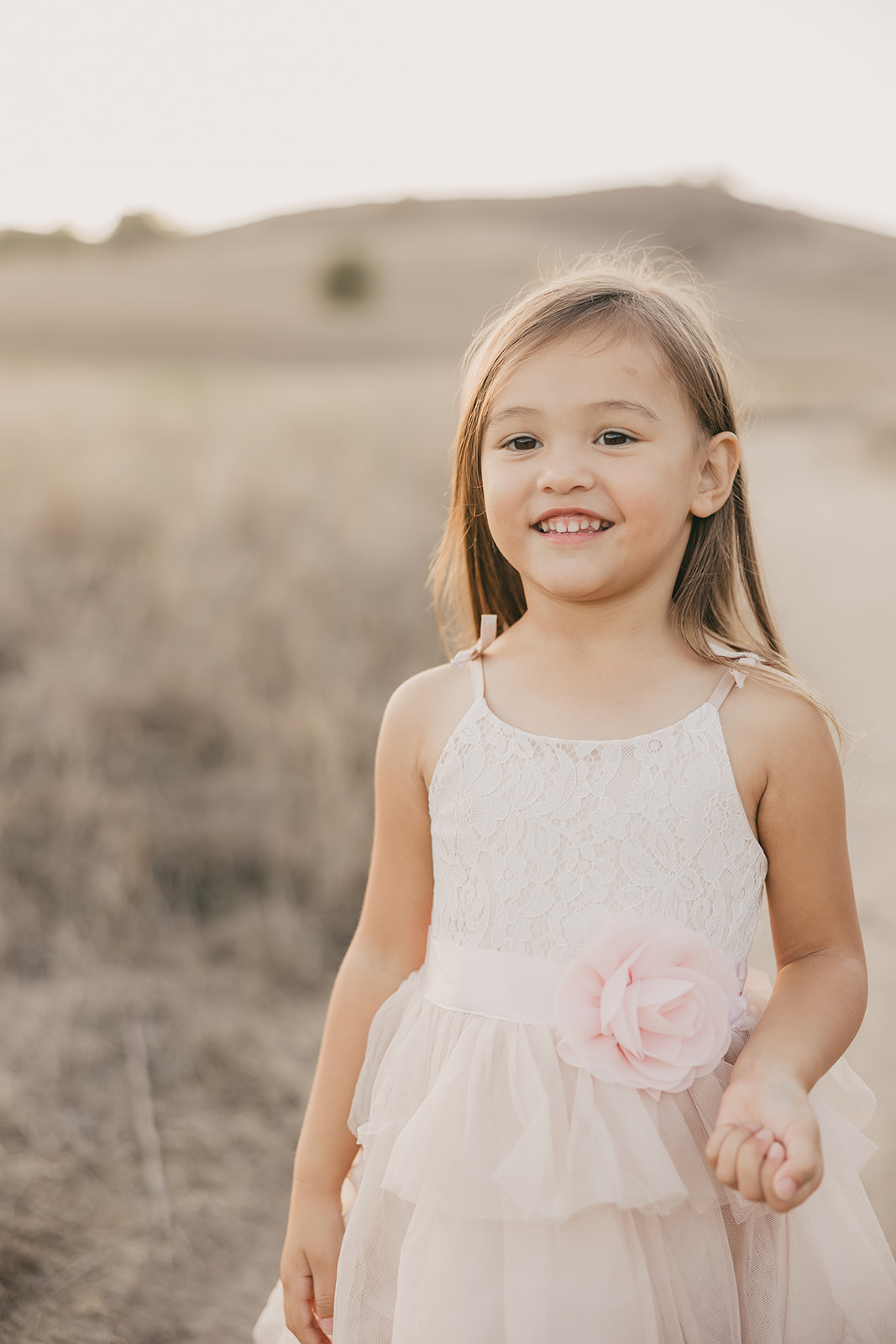 One of the girls in her flower dress